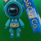 Teal astronaut keychain