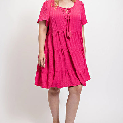 Textured woven tiered dress with tassel tie and pockets