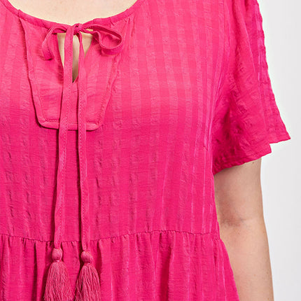 Textured woven tiered dress with tassel tie and pockets